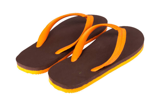 istock sandals  flip flops color brown orange isolated on white background 1459857208