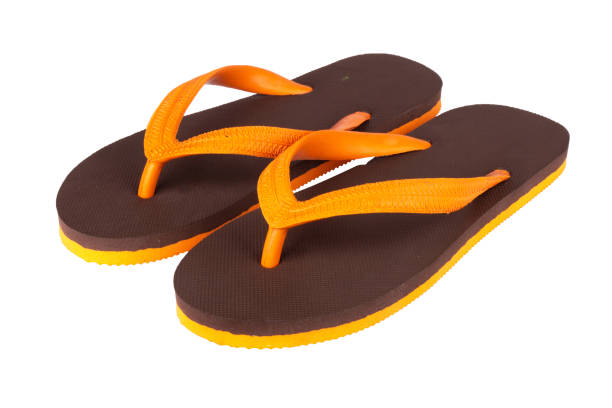 istock sandals  flip flops color brown orange isolated on white background 1459857347