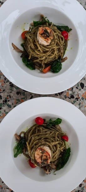 istock Spaghettis Pesto with Prawn on Top 1459857417