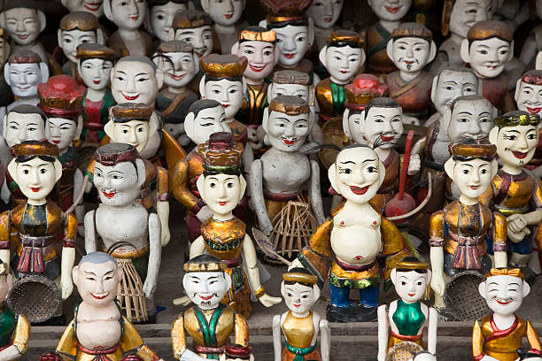 Colorful figurines in the shop. Vietnam souvenirs. Vietnam's traditional souvenirs.