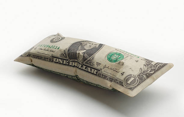 inflated dollar A picture representing the recent inflation in U.S. currency. inflatable stock pictures, royalty-free photos & images