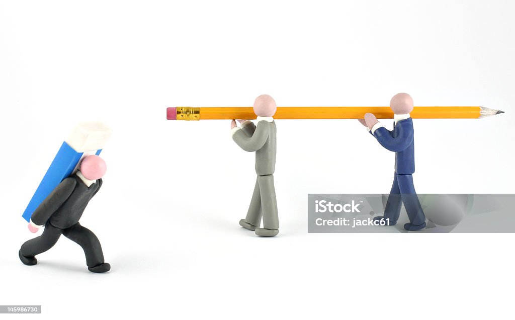 Office work Plasticine human figures humorously handling office objects on white background Adult Stock Photo