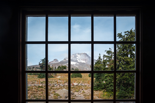 The Sunrise Day Lodge, Mount Rainier captured through a window on a clear day in autumn