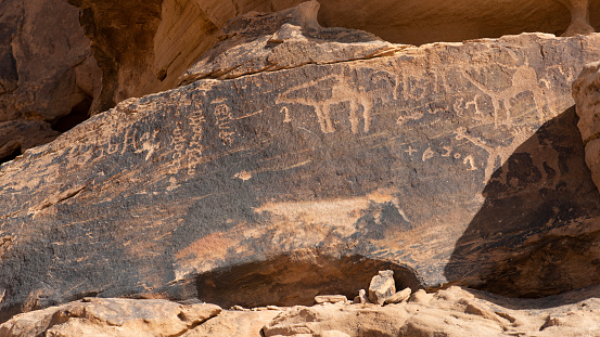 Rock carvings depicting characters and figures dating back to the talmudic period. Photographed in the desert close to Taima and Tabuck in Saudi Arabia