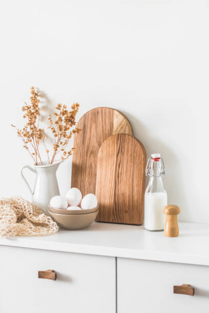istock Simple kitchen interior in Scandinavian simple style. Dishes, eggs bowl on the kitchen cabinet 1459870060