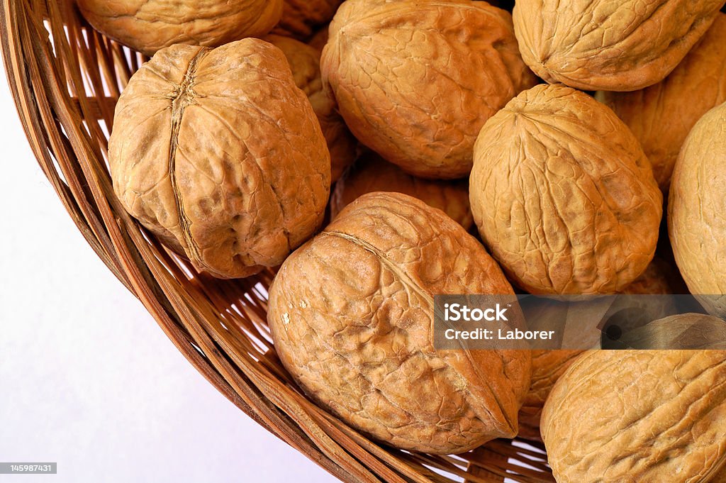 Nuts in basket Autumn Stock Photo