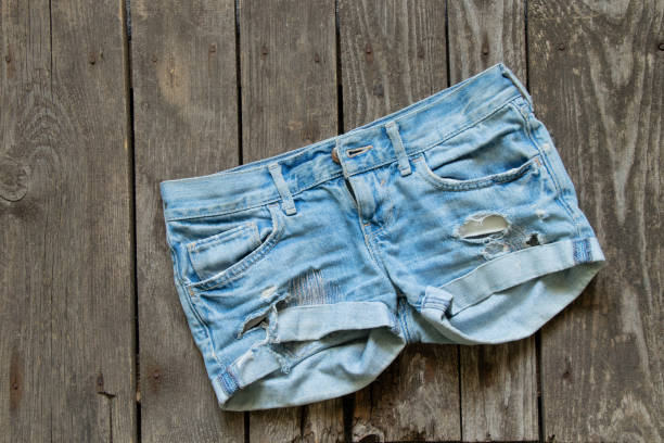 istock womens shorts lay on rustic brown background, womens clothing 1459880813