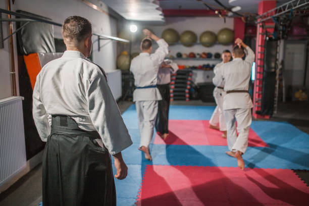 istock Young fighters learn self-defense in the gym 1459882405