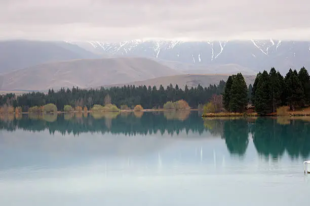 Mountain Lake South Island New Zealand, southern elps under cloud cover