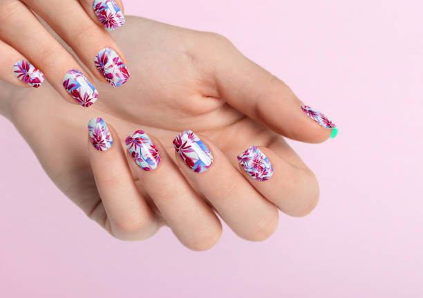 istock Beautiful female hands with red leaf manicure. Female hands on copy space. 1459885213