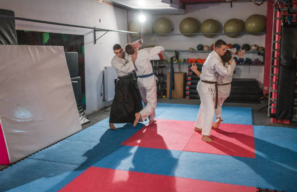 istock A group of young fighters in kimonos learn self-defense 1459893221
