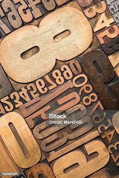 Various Wooden Numbers Aligned Together Stock Photo - Download Image Now - Angle, Antique, Art