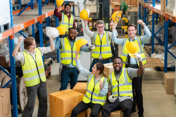 istock Raised angle portrait group photo of workers inside a food distribution warehouse 1459895194