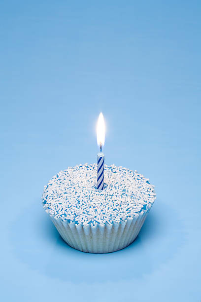 Blue Cupcake with Candle stock photo