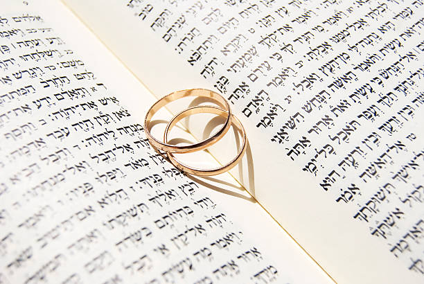 istock Wedding rings on the Torah 145989698