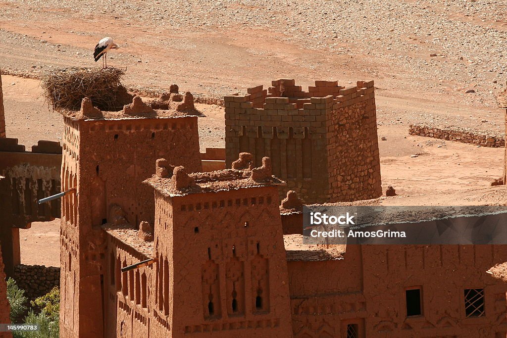 Old Kazba in Morocco Ancient Kazba in ruin in Morocco. A crane nests on the top of it. Ancient Stock Photo