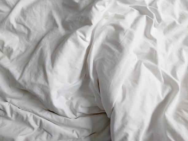 istock Bed Sheets background or bed cover in the hotel 1459912880