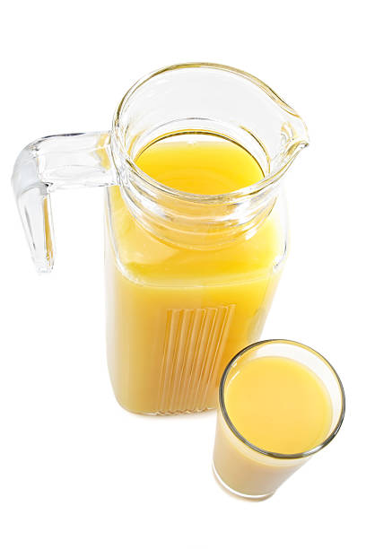 istock orange juice jug and glass 145991381