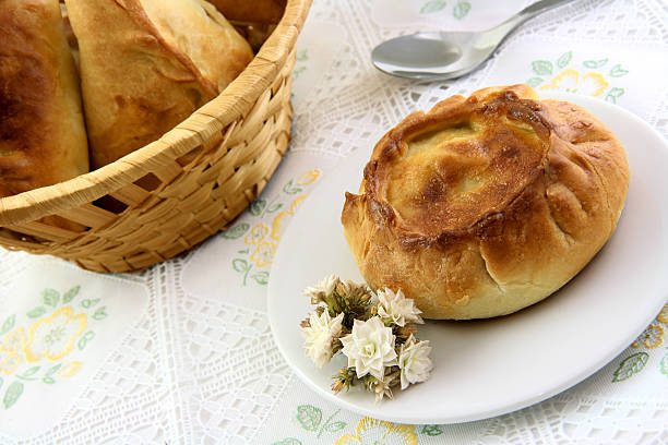 istock Appetizing pie and basket of patty in the tablecloth 145991436