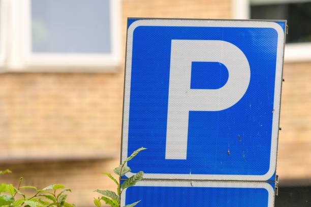 istock Closeup of a blue parking sign 1459917800