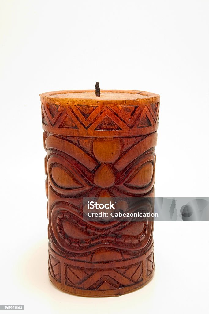 Tiki candle A Tiki candle on a white background. Big Island - Hawaii Islands Stock Photo