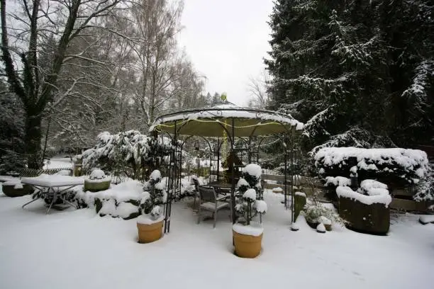 Pavillion in a garden at Hermannsee, near to Pforzheim, South of Germany in the snow