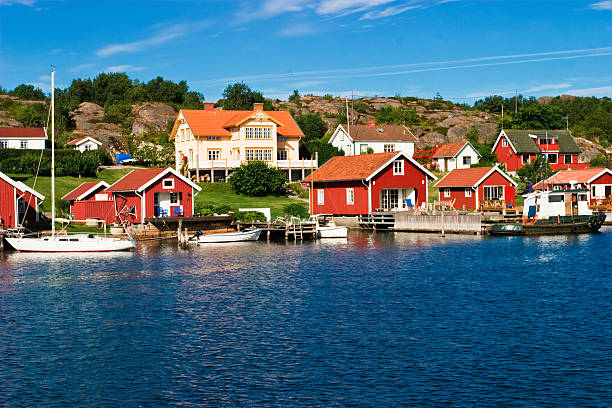 istock Red color wall summer house by the lake 145992363