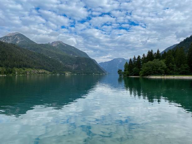 istock Lake with mountain panorama and fog 1459927045