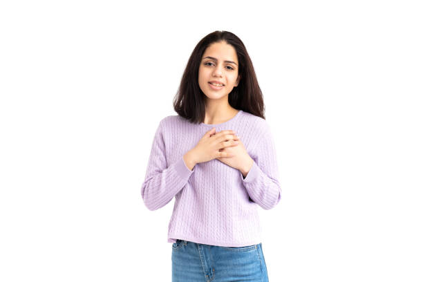 istock Latin woman with hands on her heart 1459930496