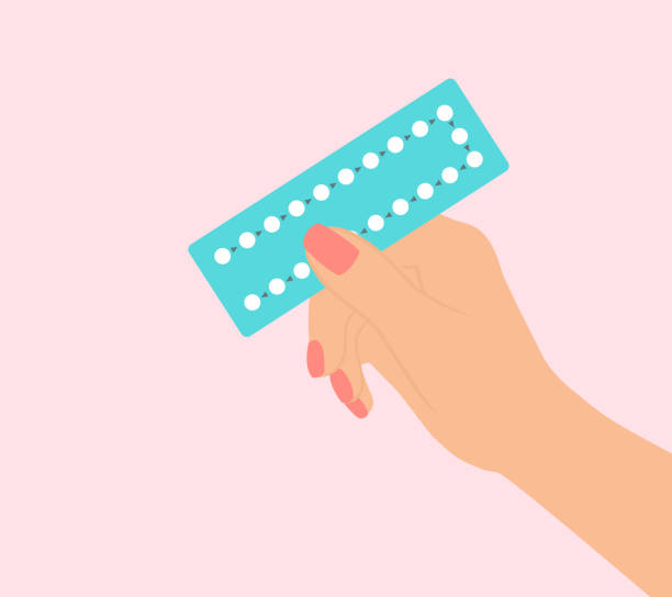 female hand holding birth control pills on pink background - 家庭計劃 幅插畫檔、美工圖案、卡通及圖標