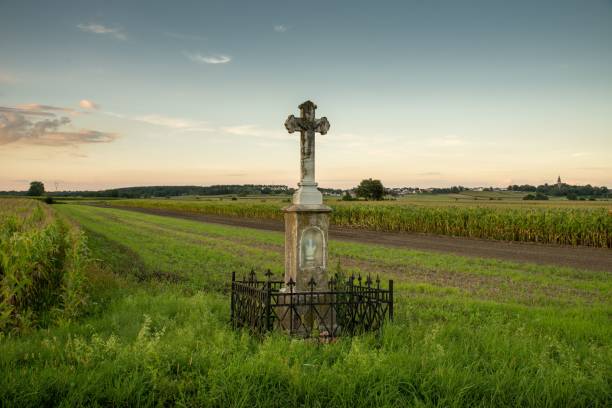 An old roadside brick cross in Upper Silesia, Opole Voivodeship, Poland