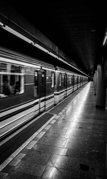istock Vertical shot of a train in a subway. Black and white 1459931095