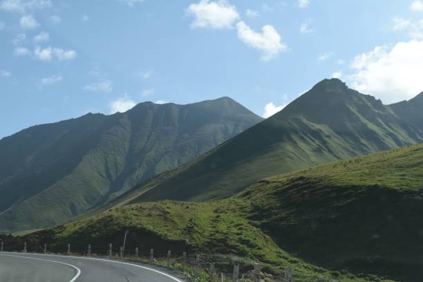 istock Image of green mountains under the cloudy sky. 1459931467