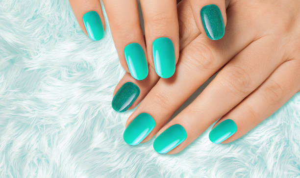 istock Light blue manicure on female hands. Nails design. 1459933388