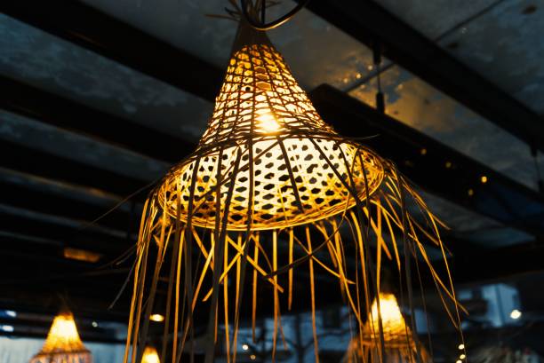 istock Closeup of illuminated pendant lamp rattan cone indoor 1459934263