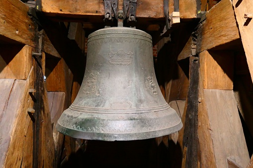 A closeup of old church bell