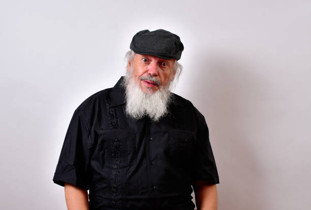 istock Mature American male with a long white beard is posing with a puzzled look 1459934354