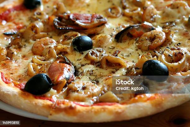 Seafood Pizza Stock Photo - Download Image Now - Black Color, Black Olive, Cheese