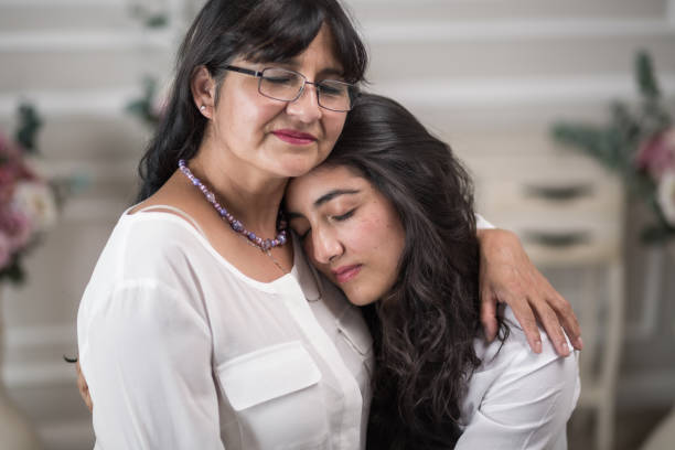 istock Mother and daughter hugging on the mother's day 1459938202