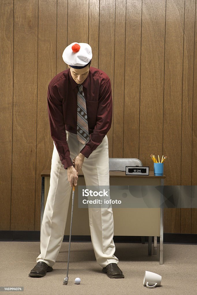 Spielen Sie golf im Büro. - Lizenzfrei Golf Stock-Foto