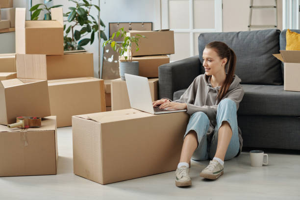 istock Woman searching for new flat online 1459945340