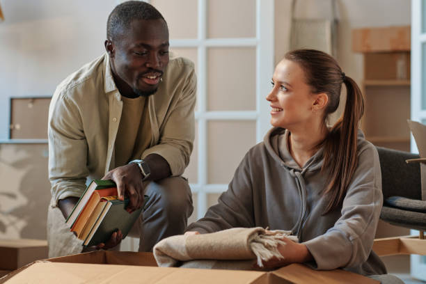 istock Multiethnic couple moving to a new apartment 1459946126