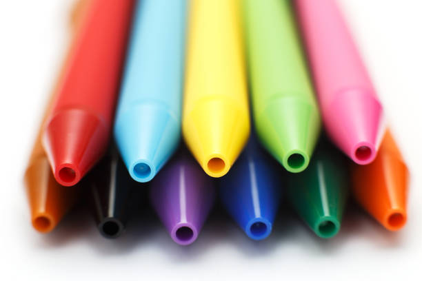 Multicolored gel pens isolated on a white background, close-up. Copy space.Multicolored gel pens isolated on a white background, close-up. Copy space.Multicolored in rainbow colors gel pens isolated on a white background, close-up. Copy space.