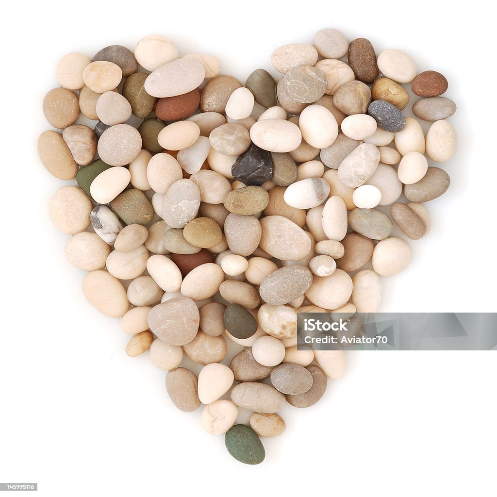 Пляж камнями в форме сердца - Стоковые фото Абстрактный роялти-фри