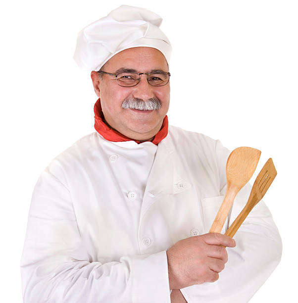 istock chef with a wooden spoons 145995381