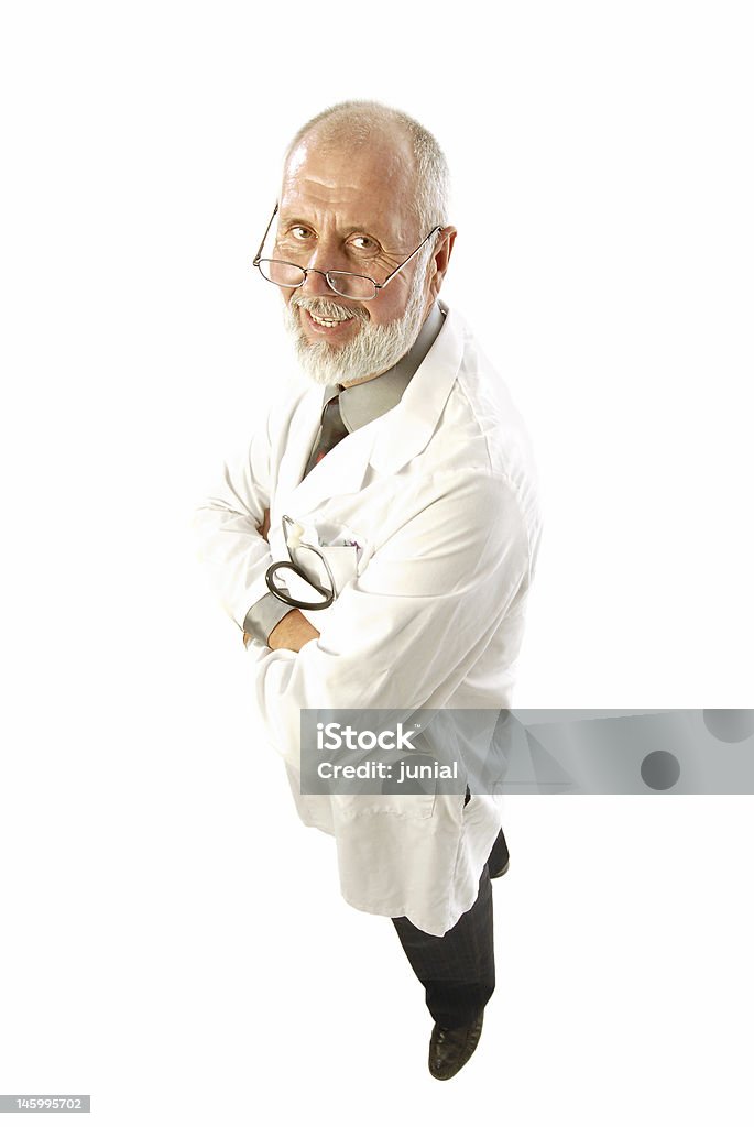 Smiling older doctor Older, happy doctor or scientist in a labcoat; isolated on white 50-59 Years Stock Photo