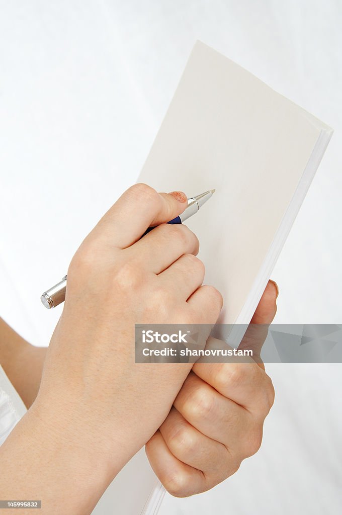 signing the document Hand of the woman signing the document Business Stock Photo