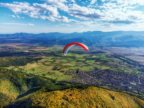 Amazing aerial shot of paragliding in Balkan Mountains, Bulgaria.