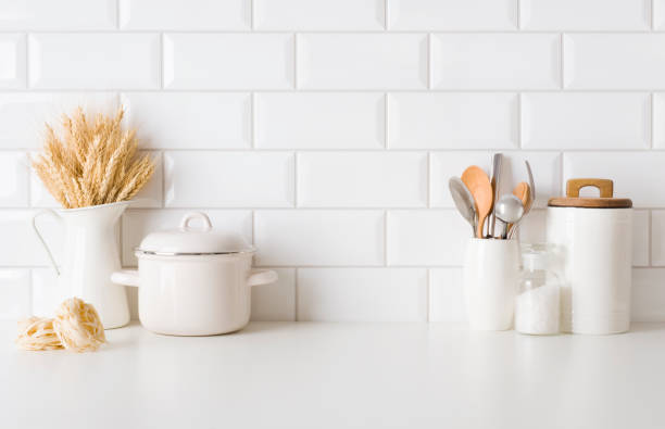 istock Cooking utensils and pasta on kitchen table with copy space 1459963856