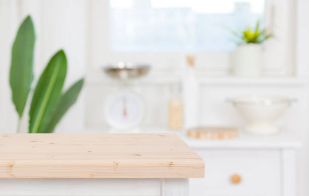 istock Table top on blur kitchen counter background for product display 1459963895